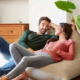 a couple chatting on a beanbag